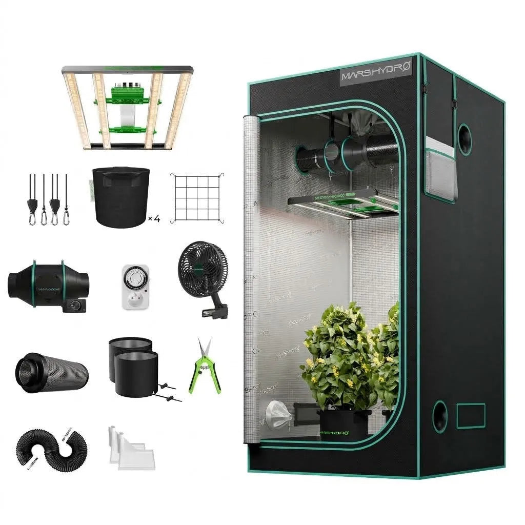 Black indoor grow tent with reflective interior, leafy plant, LED light, ventilation fan, pots, timer, and accessories
