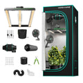 Black and teal indoor grow tent with LED light, ventilation fans, carbon filter, plant trellis, and accessories